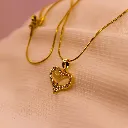 Locket_Heart_Golden_stone.webp